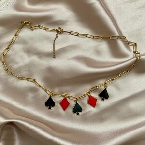 Gold Chain Necklace with Red and Black Charms